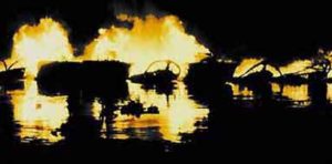 Figure M: PT boat burning in the Philippines.